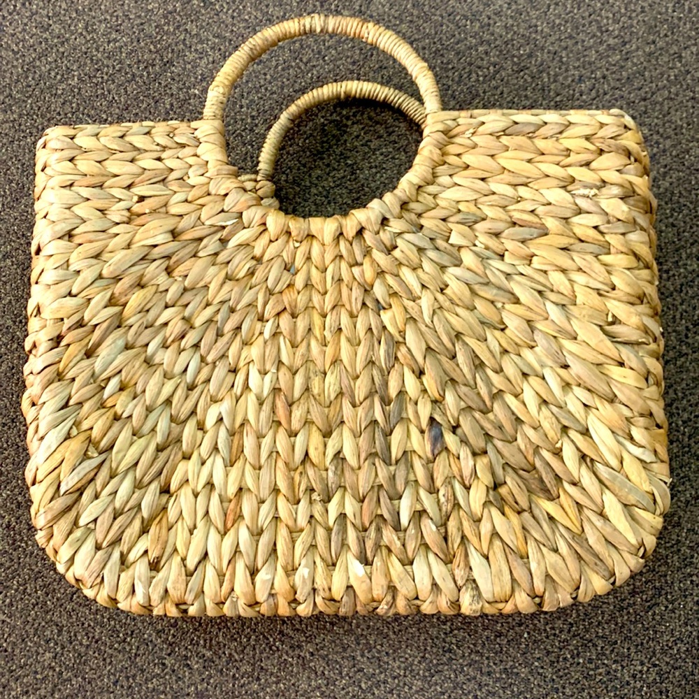 Large,tan in color, rings handles